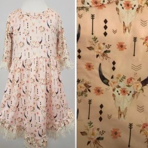 Precious bullhorn dress!